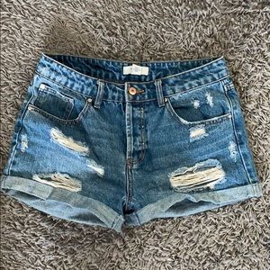 Distressed denim shorts